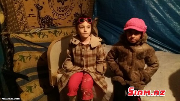 Hövsan sakinləri çadır qurdular: “Binamız başımıza uçur” FOTOLAR Hövsan sakinləri çadır qurdular: “Binamız başımıza uçur” FOTOLAR
